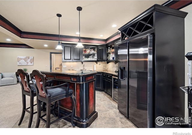 2055 Vineyard Dr, Windsor, CO 80550 - indoor wet bar with crown molding, pendant lighting, black fridge, recessed lighting, and wine cooler