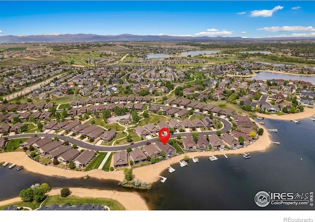 2055 Vineyard Dr, Windsor, CO 80550 - aerial overview of property's location featuring a water and mountain view and nearby suburban area