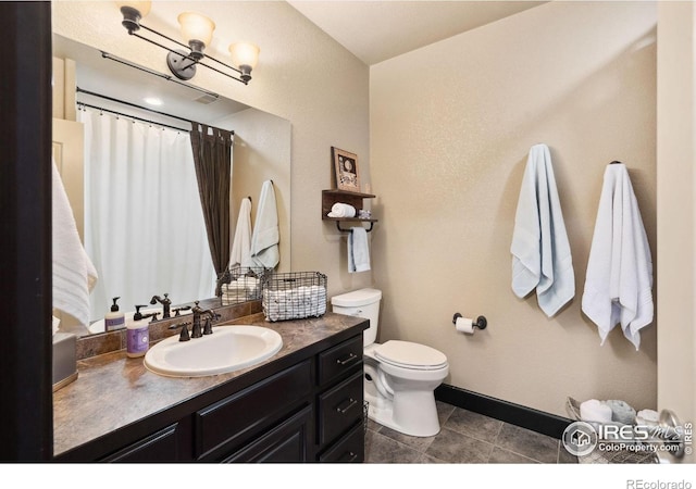 2055 Vineyard Dr, Windsor, CO 80550 - bathroom featuring vanity, a shower with shower curtain, and a chandelier