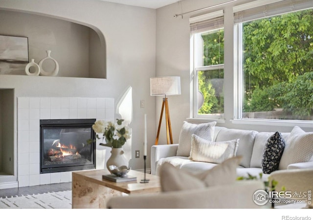 2133 Katahdin Dr, Fort Collins, CO 80525 - living area featuring a fireplace and wood finished floors