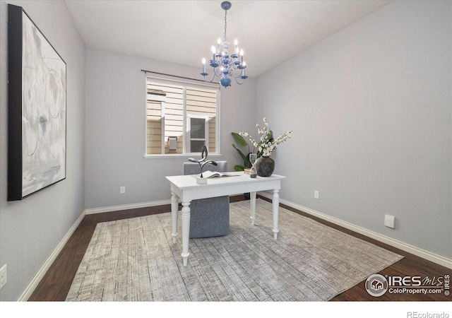 2133 Katahdin Dr, Fort Collins, CO 80525 - office area with wood finished floors and a chandelier