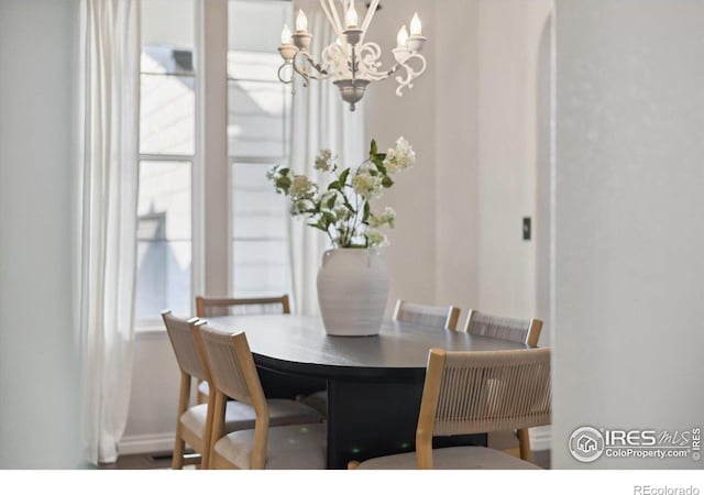 2133 Katahdin Dr, Fort Collins, CO 80525 - dining space featuring a chandelier