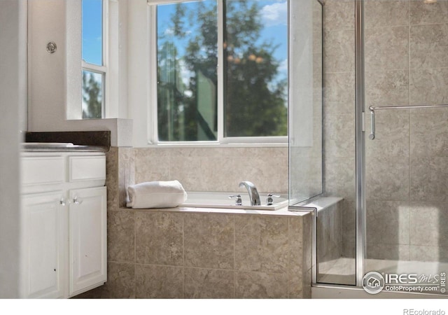 2133 Katahdin Dr, Fort Collins, CO 80525 - bathroom with a stall shower, a bath, and vanity
