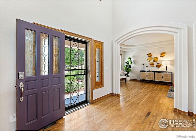 14601 Akron St, Brighton, CO 80602 - entrance foyer with light wood finished floors and baseboards