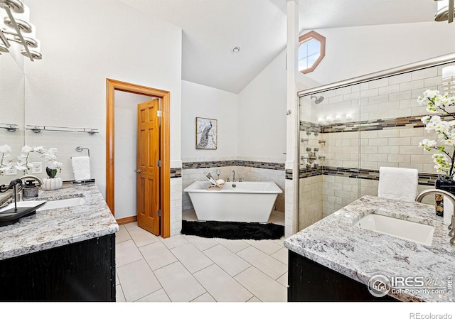 14601 Akron St, Brighton, CO 80602 - bathroom with vanity, vaulted ceiling, a stall shower, a soaking tub, and tile walls