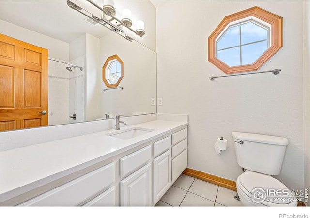 14601 Akron St, Brighton, CO 80602 - full bath with vanity, tile patterned floors, and a shower