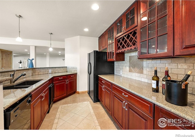 14601 Akron St, Brighton, CO 80602 - kitchen with black appliances, light tile patterned floors, dark brown cabinets, decorative light fixtures, and recessed lighting