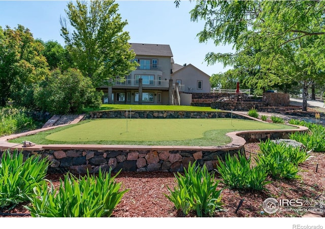 14601 Akron St, Brighton, CO 80602 - view of community featuring a putting green