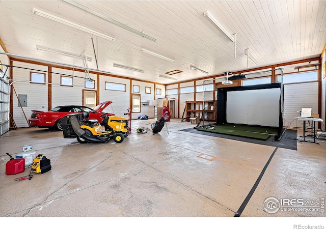 14601 Akron St, Brighton, CO 80602 - garage featuring a garage door opener