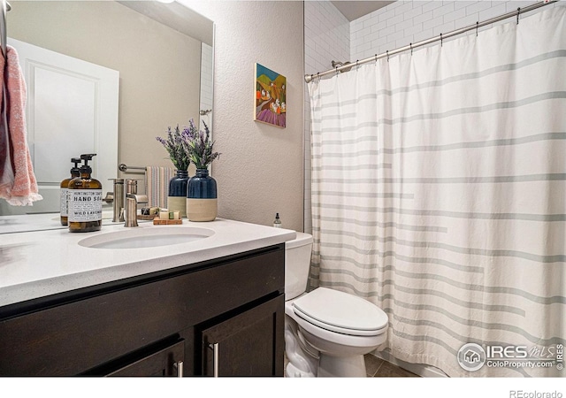 2716 San Cristobal Ct, Timnath, CO 80547 - full bathroom featuring vanity, a textured wall, and a shower with shower curtain