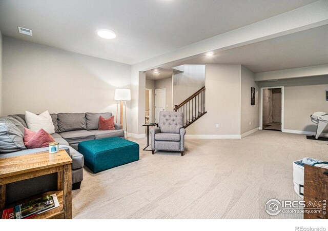 2716 San Cristobal Ct, Timnath, CO 80547 - living room featuring stairway, carpet floors, and recessed lighting