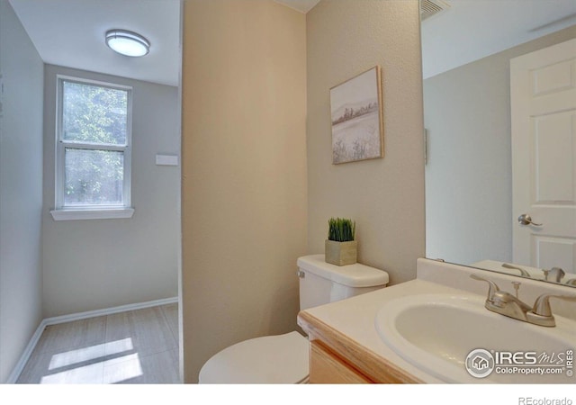 13382 Franklin St, Thornton, CO 80241 - bathroom featuring toilet and vanity