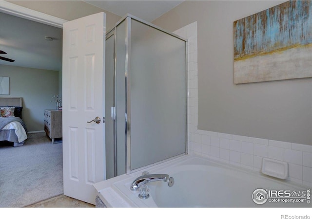 13382 Franklin St, Thornton, CO 80241 - bathroom with ensuite bathroom, a bath, and a shower stall