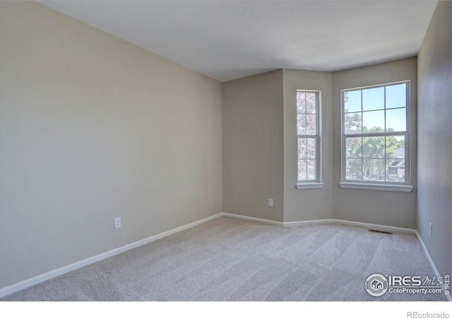 13382 Franklin St, Thornton, CO 80241 - unfurnished room with light colored carpet and baseboards