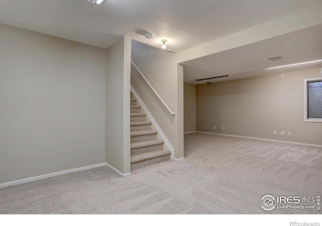 13382 Franklin St, Thornton, CO 80241 - finished below grade area featuring carpet floors and stairway