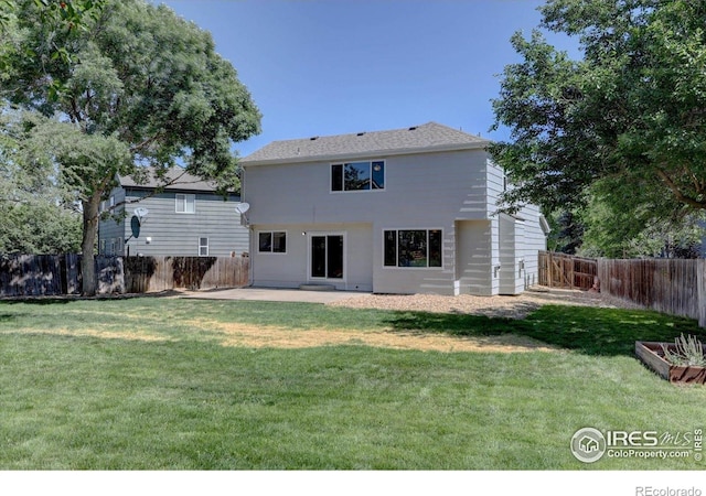13382 Franklin St, Thornton, CO 80241 - rear view of property with a fenced backyard and a patio
