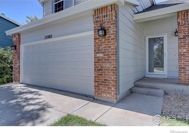 13382 Franklin St, Thornton, CO 80241 - garage featuring driveway