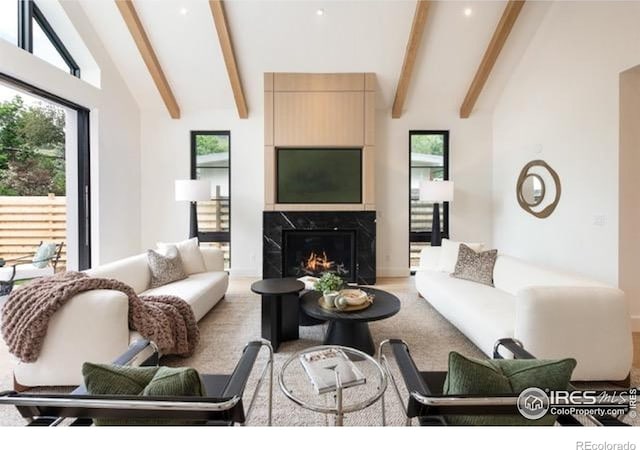 640 Iris Ave, Boulder, CO 80304 - living room featuring beam ceiling, a high end fireplace, and high vaulted ceiling