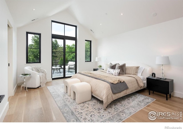 640 Iris Ave, Boulder, CO 80304 - bedroom featuring access to outside, high vaulted ceiling, and light wood finished floors
