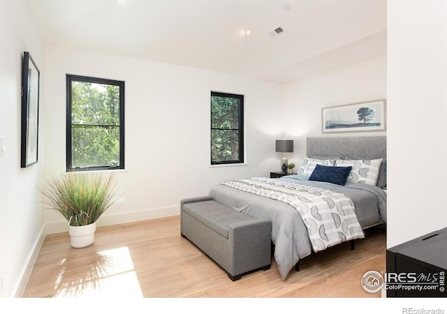 640 Iris Ave, Boulder, CO 80304 - bedroom featuring light wood-style floors and baseboards