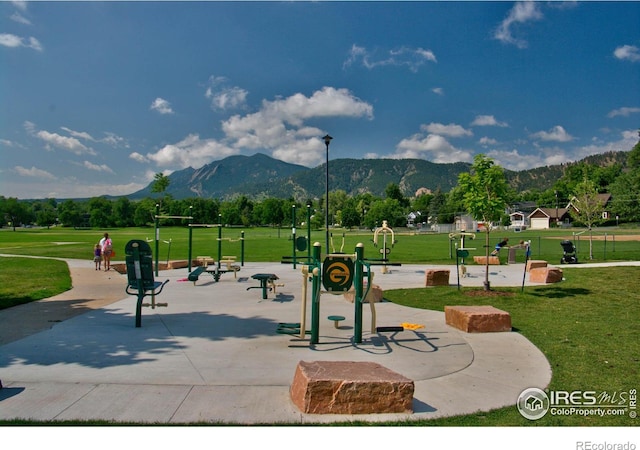 640 Iris Ave, Boulder, CO 80304 - surrounding community featuring a mountain view and a lawn