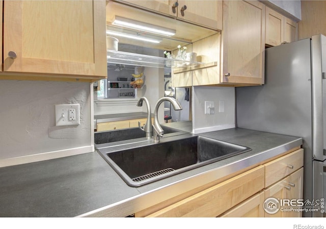 2636 Juniper Ave Unit 1, Boulder, CO 80304 - kitchen featuring light brown cabinets and freestanding refrigerator