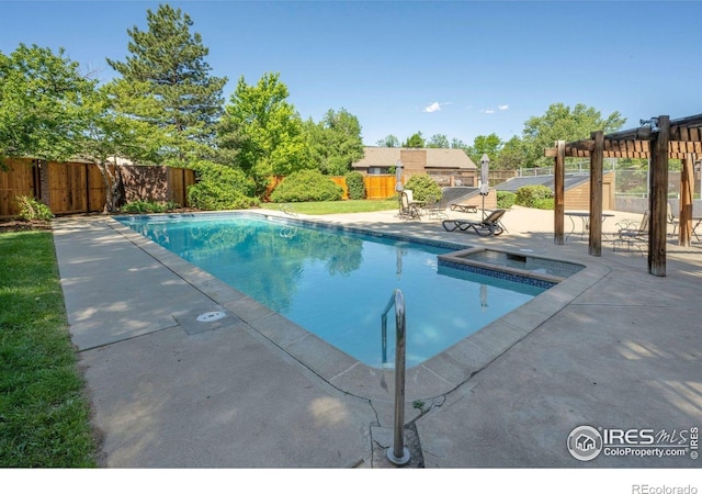 2636 Juniper Ave Unit 1, Boulder, CO 80304 - view of swimming pool with a patio, a fenced backyard, and a pool with connected hot tub
