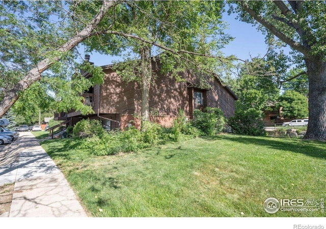 2636 Juniper Ave Unit 1, Boulder, CO 80304 - view of front of property with a front lawn and brick siding