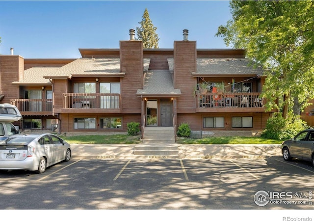 2636 Juniper Ave Unit 1, Boulder, CO 80304 - view of building exterior with uncovered parking