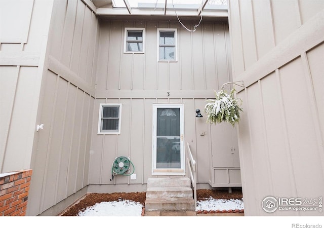 3025 Regatta Ln Unit 3, Fort Collins, CO 80525 - doorway to property featuring board and batten siding