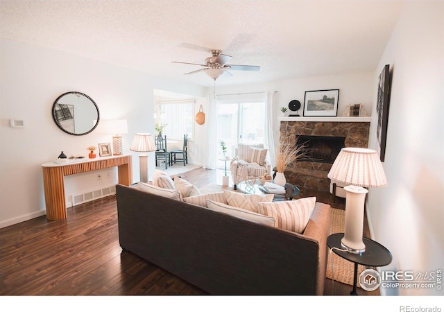 3025 Regatta Ln Unit 3, Fort Collins, CO 80525 - living room featuring wood finished floors, ceiling fan, and a fireplace