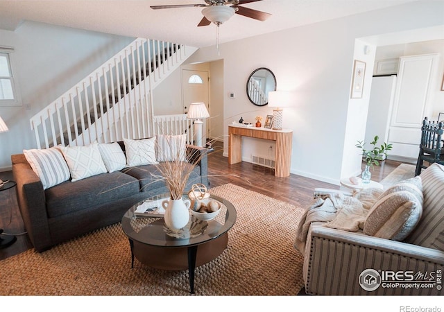 3025 Regatta Ln Unit 3, Fort Collins, CO 80525 - living room featuring a ceiling fan, wood finished floors, and stairs