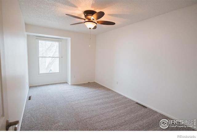 3025 Regatta Ln Unit 3, Fort Collins, CO 80525 - carpeted empty room with a ceiling fan and a textured ceiling