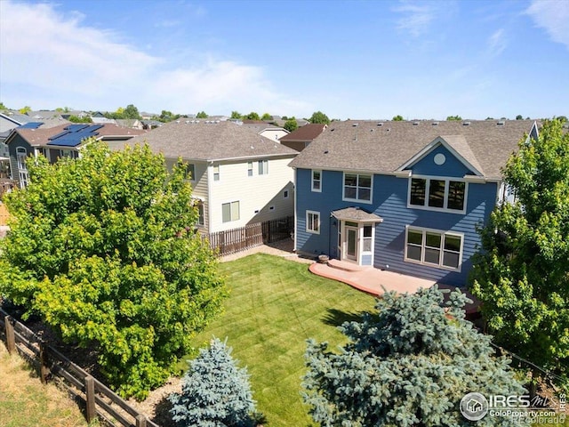 17216 E Trailmaster Dr, Parker, CO 80134 - rear view of property with a fenced backyard and a patio