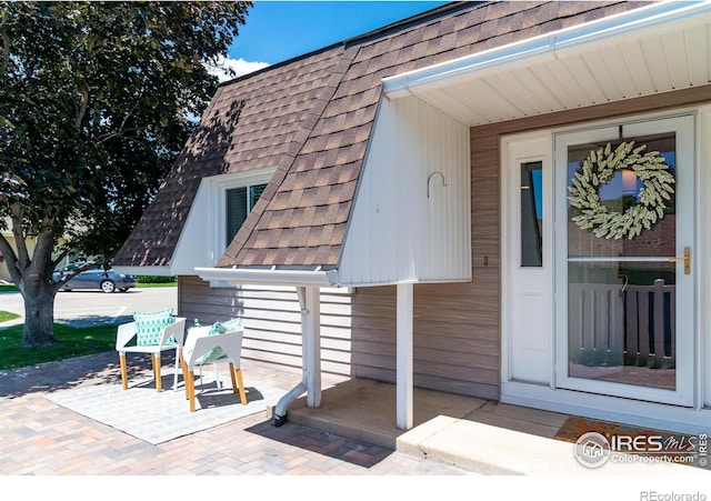 40 Walter Way, Broomfield, CO 80020 - doorway to property with a shingled roof
