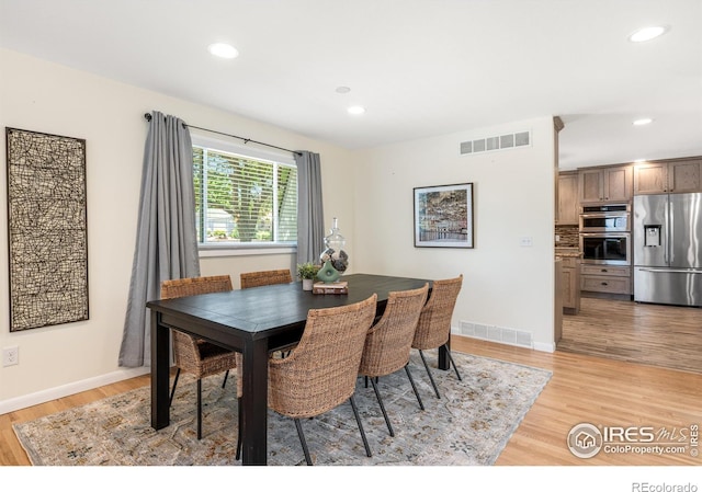 40 Walter Way, Broomfield, CO 80020 - dining area with light wood-style floors and recessed lighting
