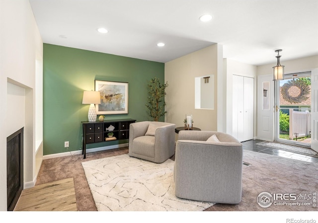 40 Walter Way, Broomfield, CO 80020 - carpeted living room with recessed lighting and a fireplace