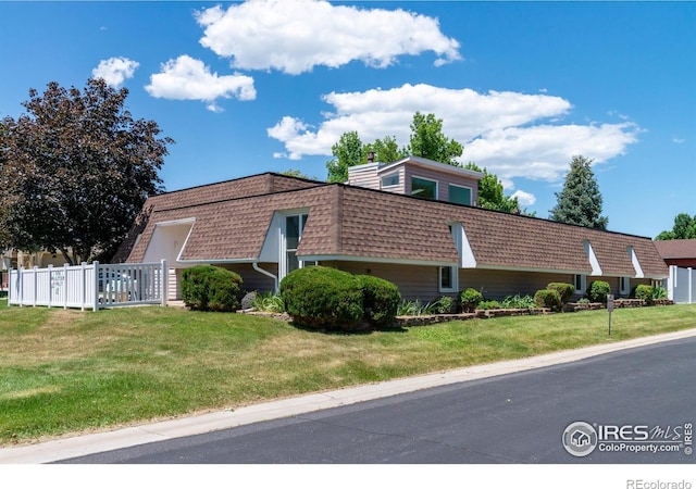 40 Walter Way, Broomfield, CO 80020 - view of property exterior featuring mansard roof and a shingled roof