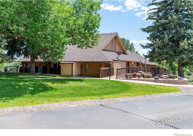40 Walter Way, Broomfield, CO 80020 - view of front of home featuring a front lawn and a shingled roof