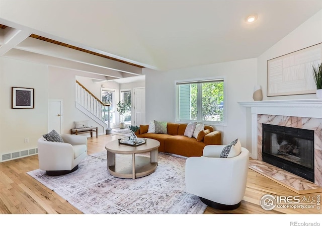 725 Union Ave, Boulder, CO 80304 - living room with stairs, wood finished floors, a premium fireplace, and recessed lighting