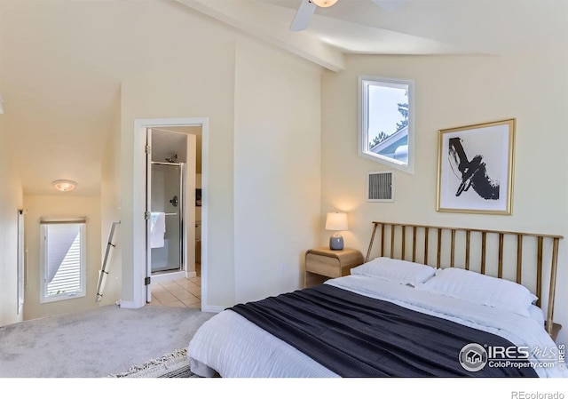 725 Union Ave, Boulder, CO 80304 - carpeted bedroom featuring tile patterned flooring, connected bathroom, and lofted ceiling