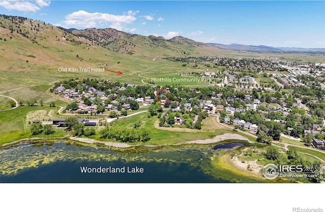 725 Union Ave, Boulder, CO 80304 - aerial overview of property's location featuring a mountain backdrop and nearby suburban area