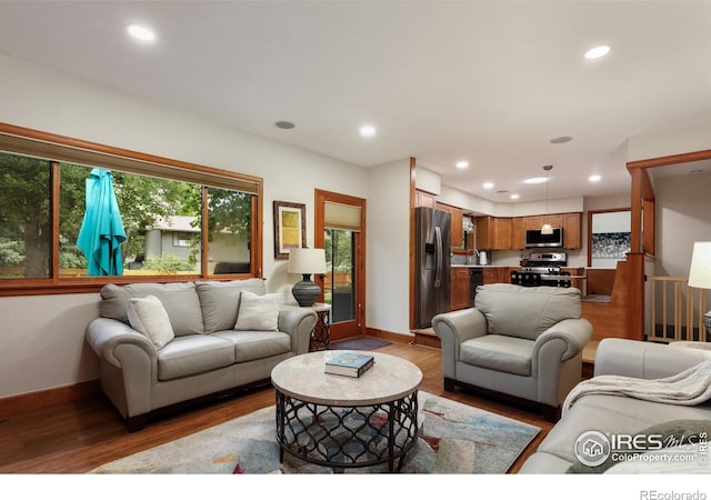 7459 Mount Meeker Rd, Longmont, CO 80503 - living area with wood finished floors and recessed lighting