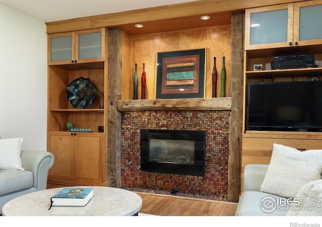 7459 Mount Meeker Rd, Longmont, CO 80503 - living room with wood finished floors, a fireplace, and recessed lighting