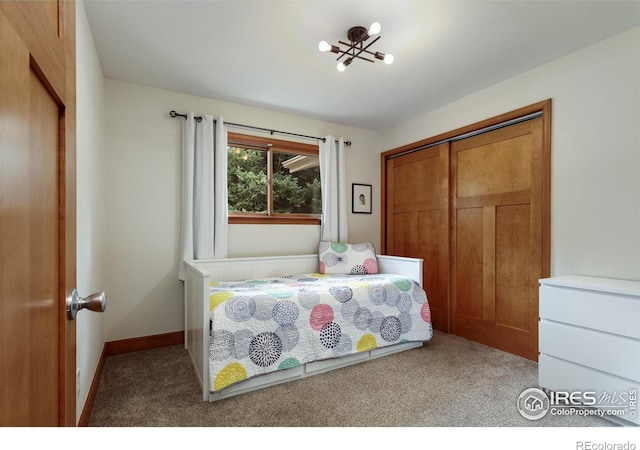 7459 Mount Meeker Rd, Longmont, CO 80503 - carpeted bedroom featuring a closet and baseboards