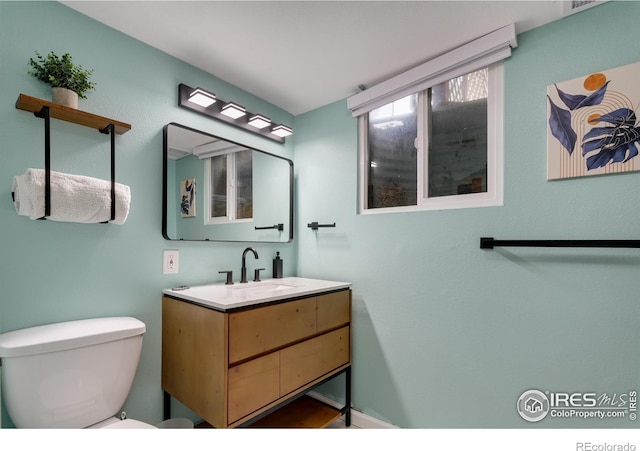 7459 Mount Meeker Rd, Longmont, CO 80503 - bathroom featuring toilet and vanity
