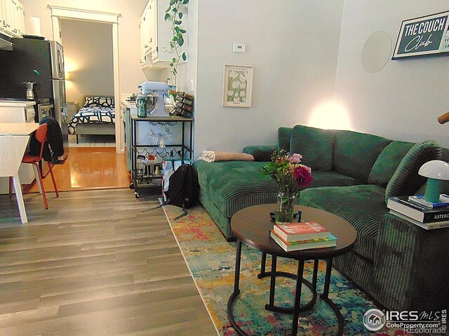 2205 Arapahoe Ave Unit 3, Boulder, CO 80302 - living room featuring wood finished floors