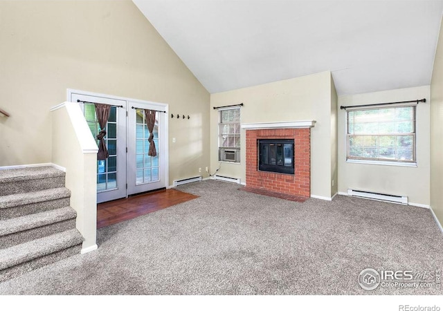 3565 Windmill Dr Unit F-7, Fort Collins, CO 80526 - unfurnished living room featuring a baseboard heating unit, carpet, high vaulted ceiling, stairway, and french doors