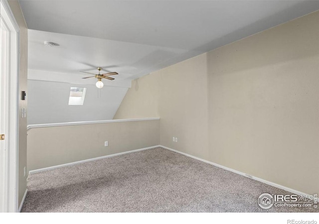 3565 Windmill Dr Unit F-7, Fort Collins, CO 80526 - additional living space with a ceiling fan, carpet, and vaulted ceiling