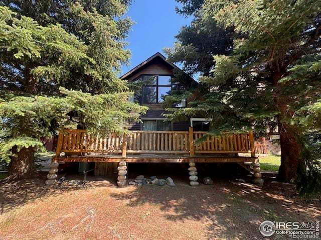 110 Meadow Ln, Bellvue, CO 80512 - back of property featuring a deck